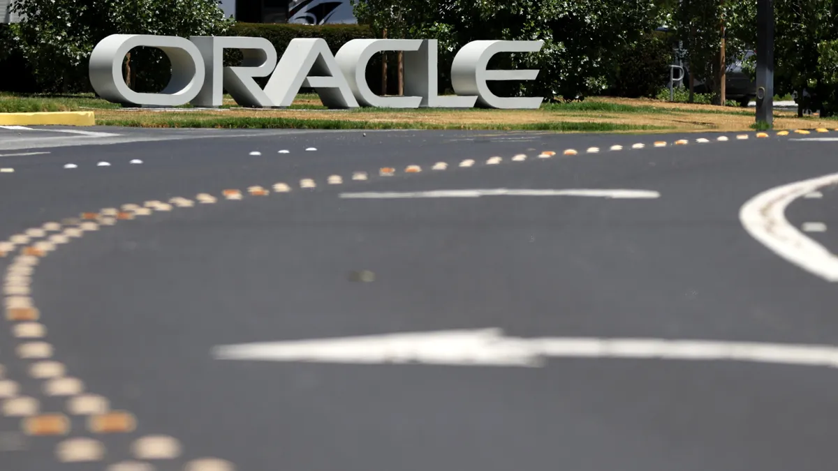 A sign is posted in front of Oracle headquarters on June 13, 2022 in Redwood Shores, California.