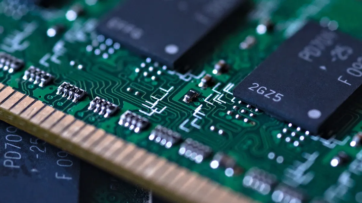 A close up image of a computer RAM memory chip.