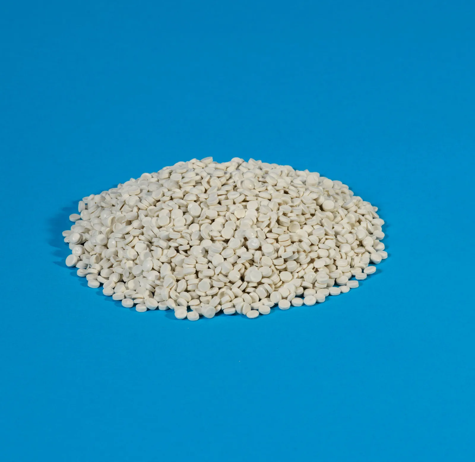 Close-up view of pellets made from recycled plastic.