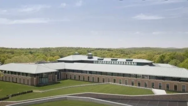 Becton Dickinson's headquarters, viewed from overhead, are surrounded by a green lawn.