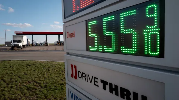 Fuel prices are displayed at a truck stop