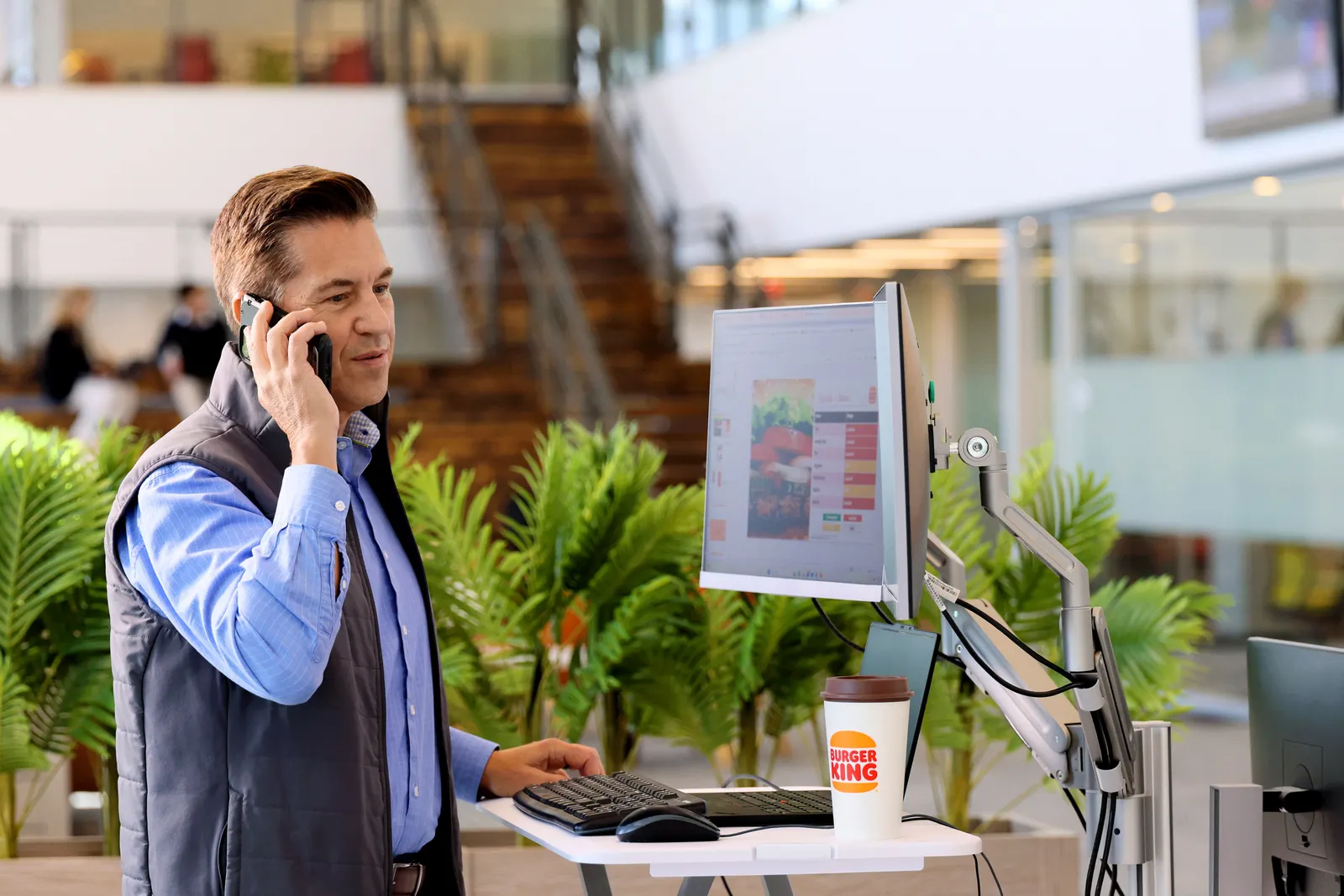 Burger King President Tom Curtis answers his phone