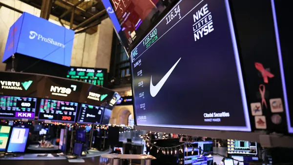 The Nike stock ticker is seen on display on the floor of the New York Stock Exchange