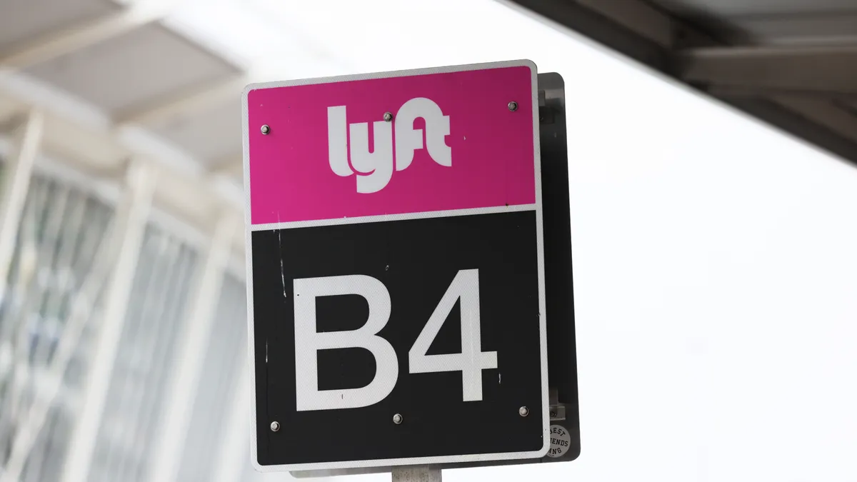 Lyft sign seen outside JFK airport