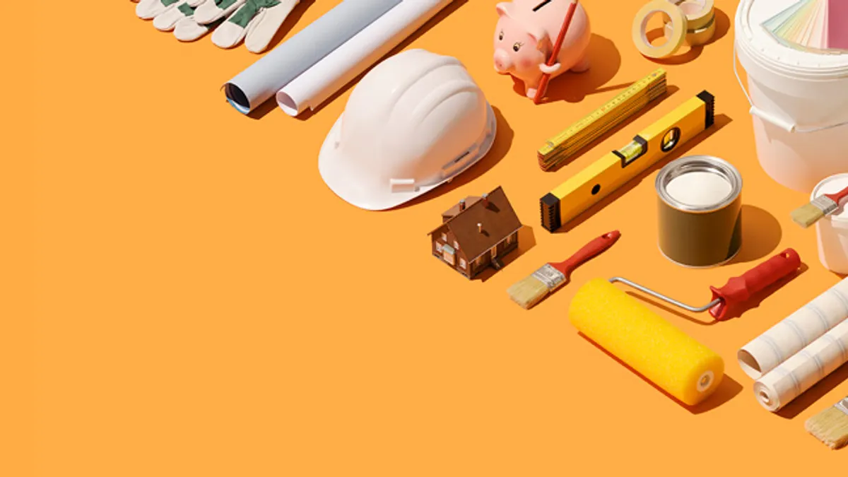 Construction supplies laid neatly on orange floor