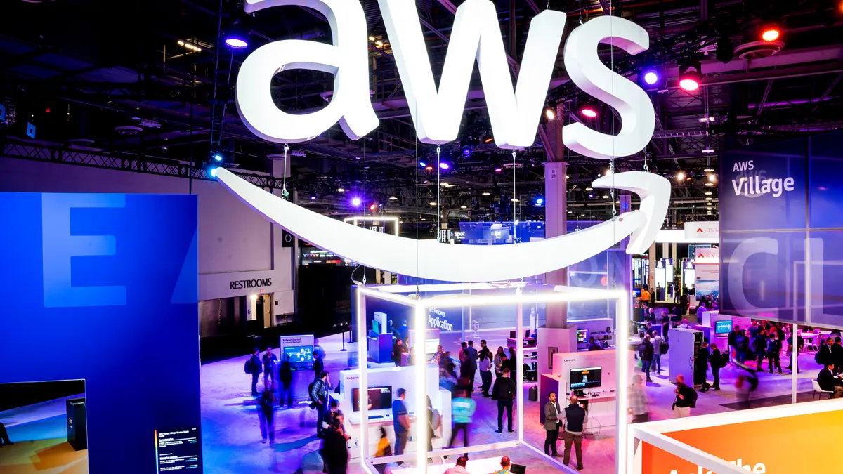 Attendees walk through an expo hall during AWS re:Invent 2022, a conference hosted by Amazon Web Services, at The Venetian Las Vegas on November 29, 2022 in Las Vegas, Nevada.