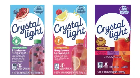 Three multicolored boxes of Crystal Light.