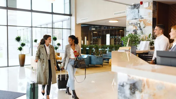 Business people walking around hotel