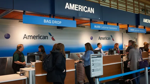 The American Airlines check-in desk in Portland International Airport.