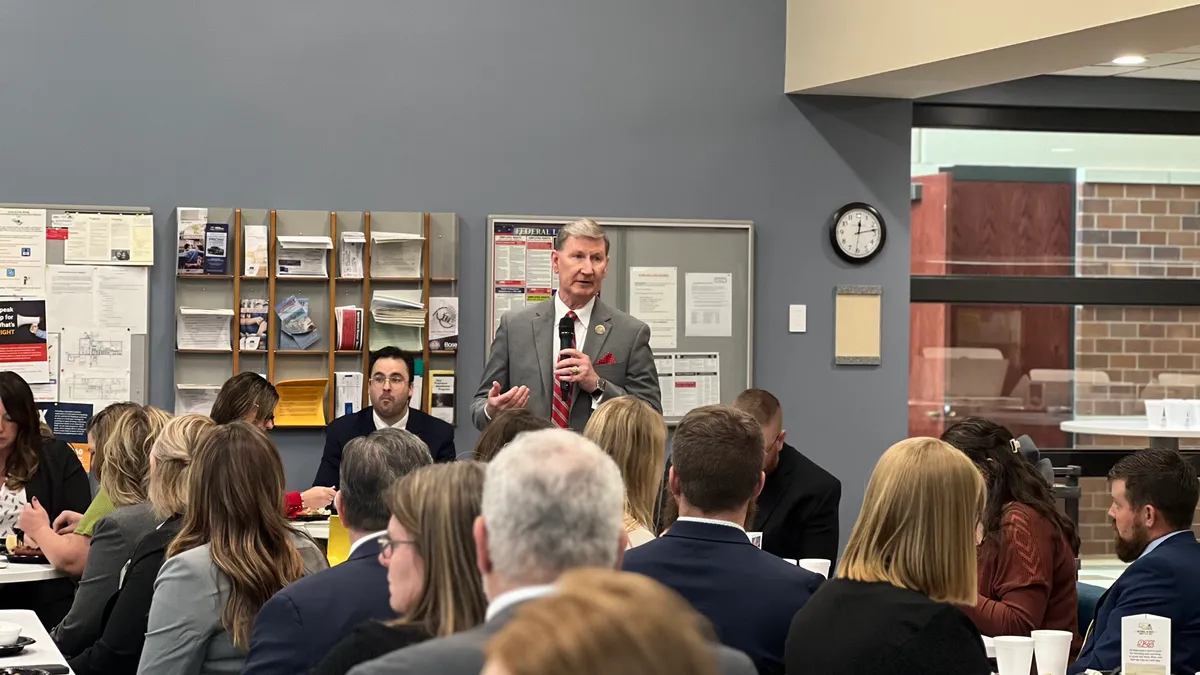 University of Nebraska System President Ted Carter makes a speech.