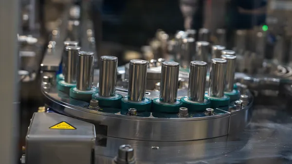 Cylinder cells shown on the production line at Panasonic's electric vehicle battery factory.