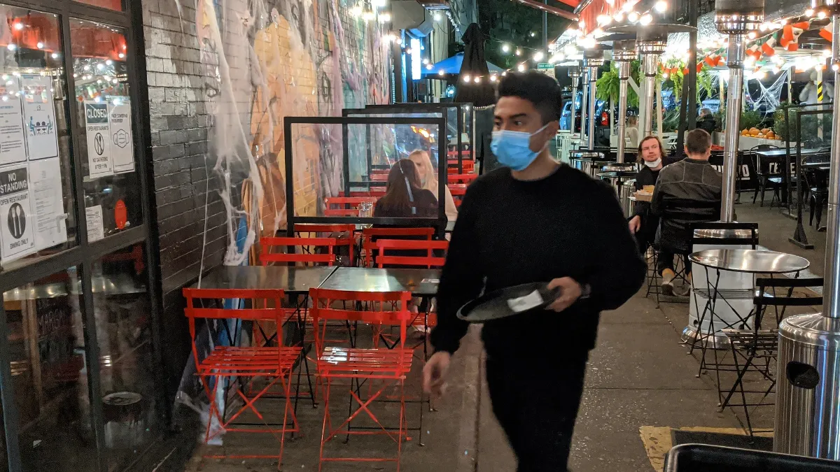 A waiter at Temerario in New York City during the coronavirus pandemic in 202