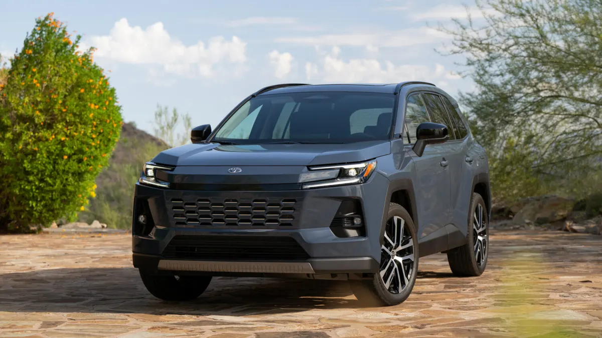 A 2026 Toyota RAV4 HEV Limited parked outdoors in a media photo with a blue sky in the background.