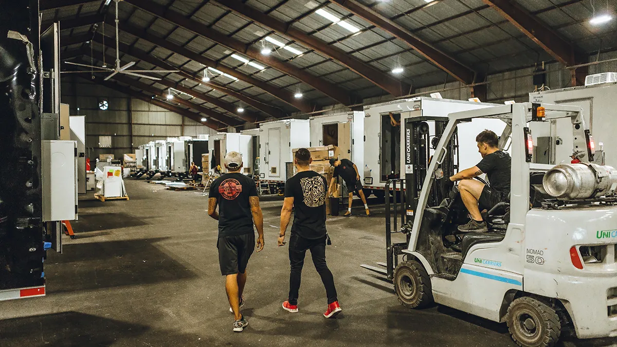 An image inside Cruising Kitchens' manufacturing facility where it builds food trucks.