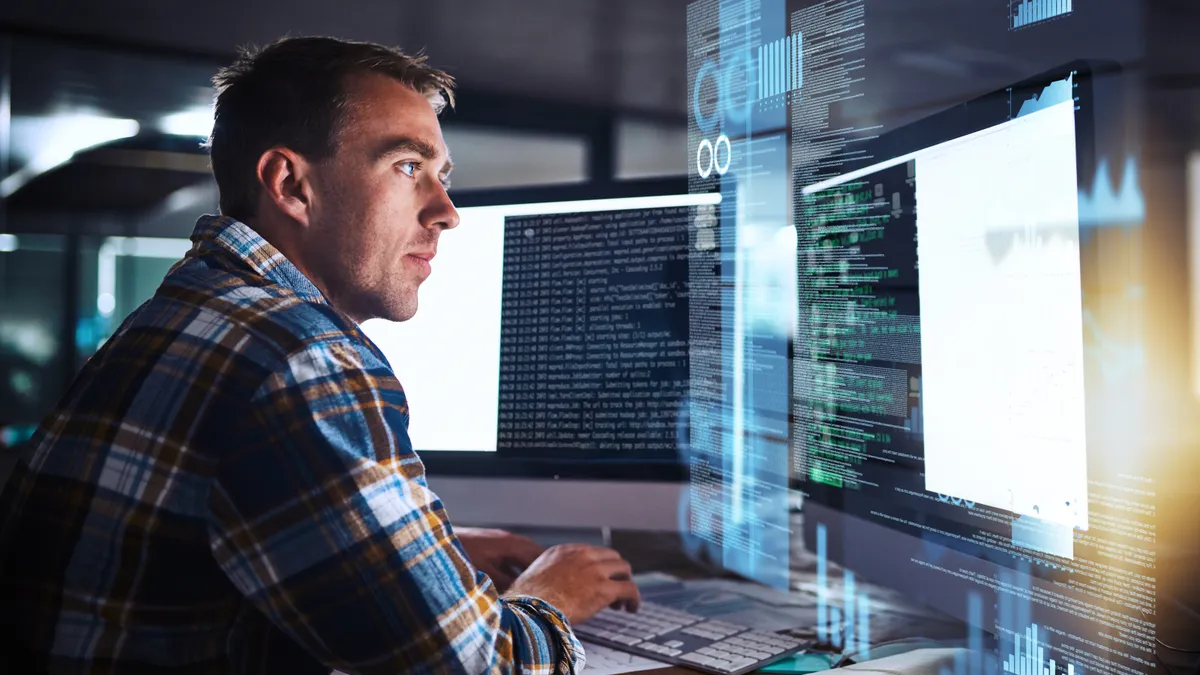 Employee in front of a laptop