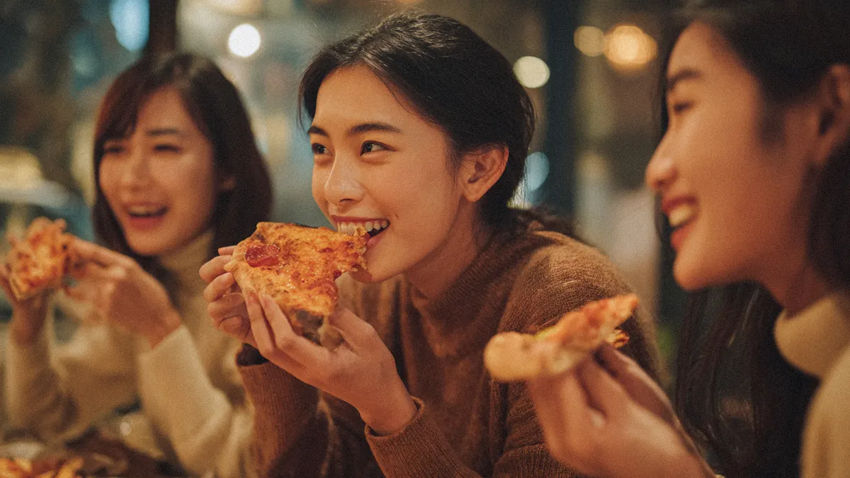 A group of friends eating pizza