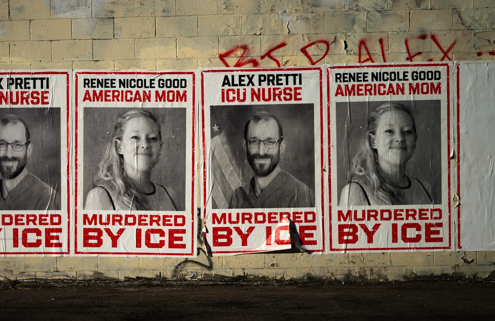 Posters memorializing Renee Good and Alex Pretti are seen on the wall of a building on Feb. 12, 2026, in Minneapolis, Minn.