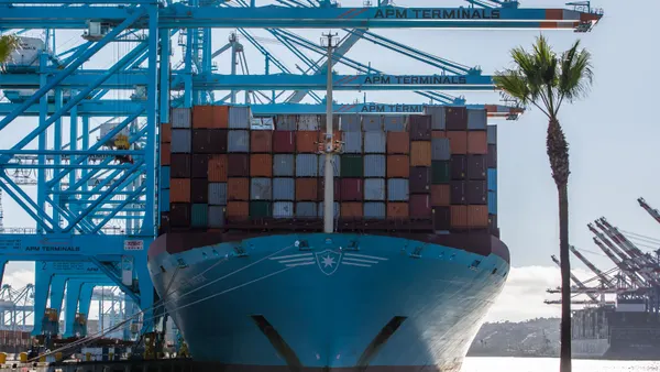 A container ship sits docked at the Port of Long Beach.