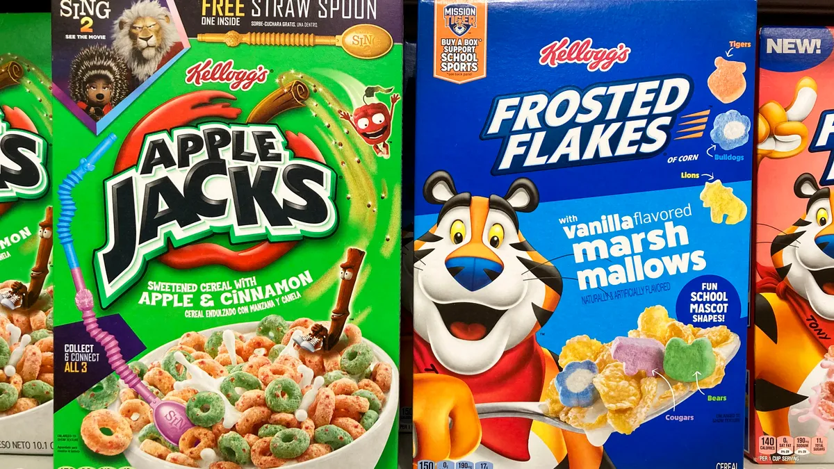 Boxes of cereal are displayed on a store shelf. One box reads "Apple Jacks" and another reads "Frosted Flakes."