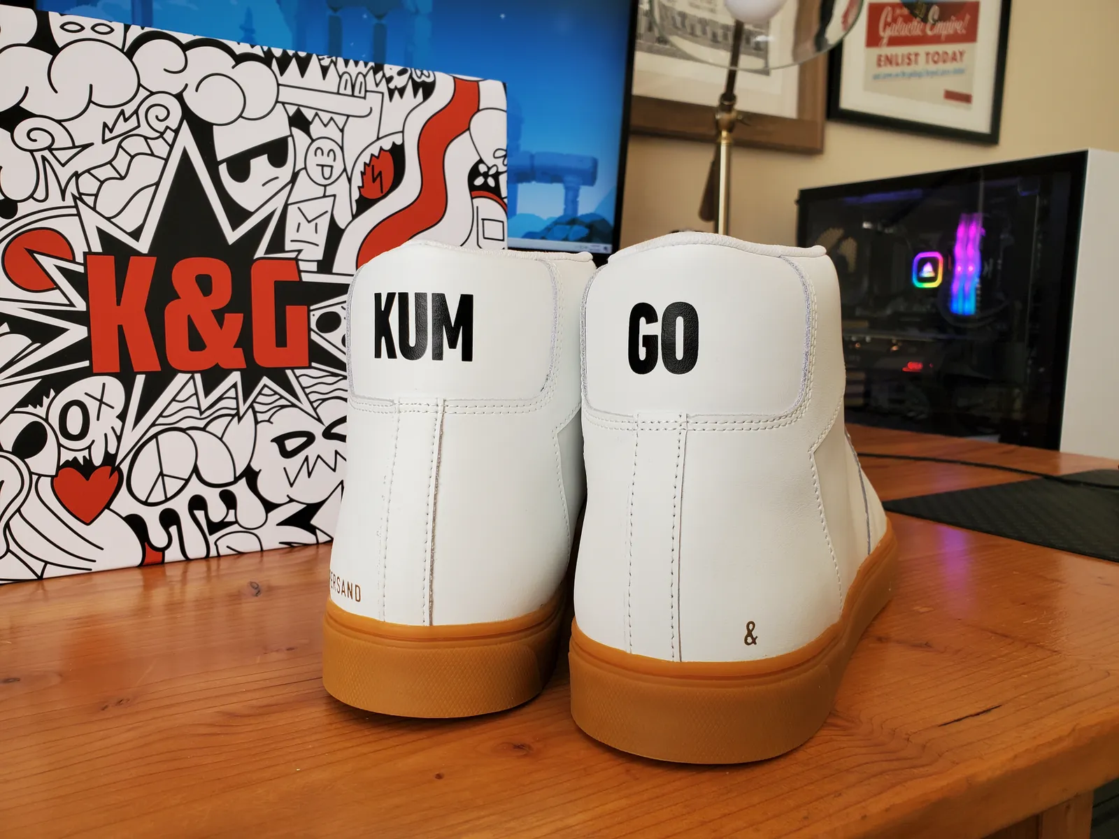 A photo of Kum &amp; Go sneakers next to their sneaker box.