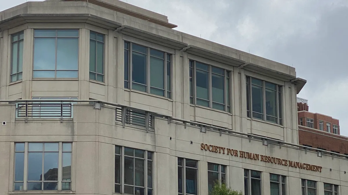 The Society for Human Resource Management logo is visible on the exterior of SHRM HQ