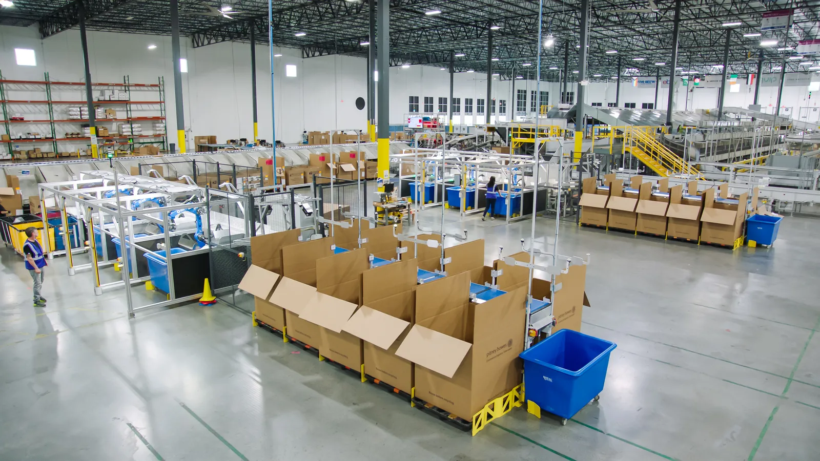 A Pitney Bowes Global Ecommerce facility with robotic sortation systems installed.