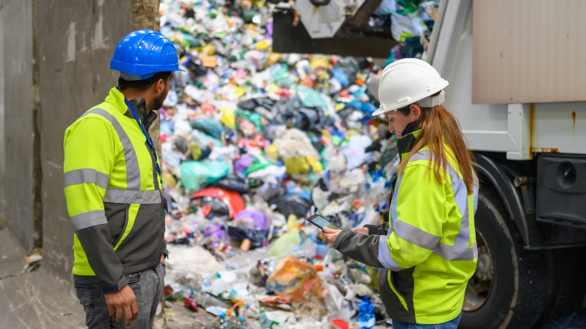Workers Discuss Waste Management