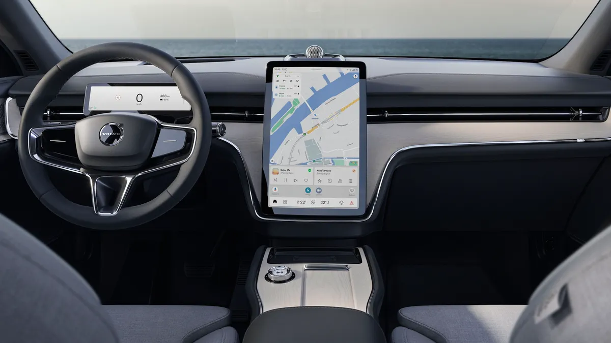 The infotainment screen showing the Android Automotive OS in a Volvo EX90 SUV,