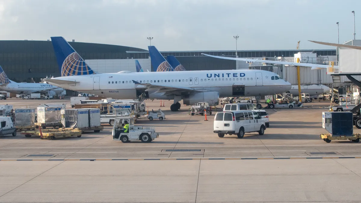 A United Airlines Airbus 320 loads up at the gate before a flight at George Bush International Airport, Houston, Texas on July 27, 2023.