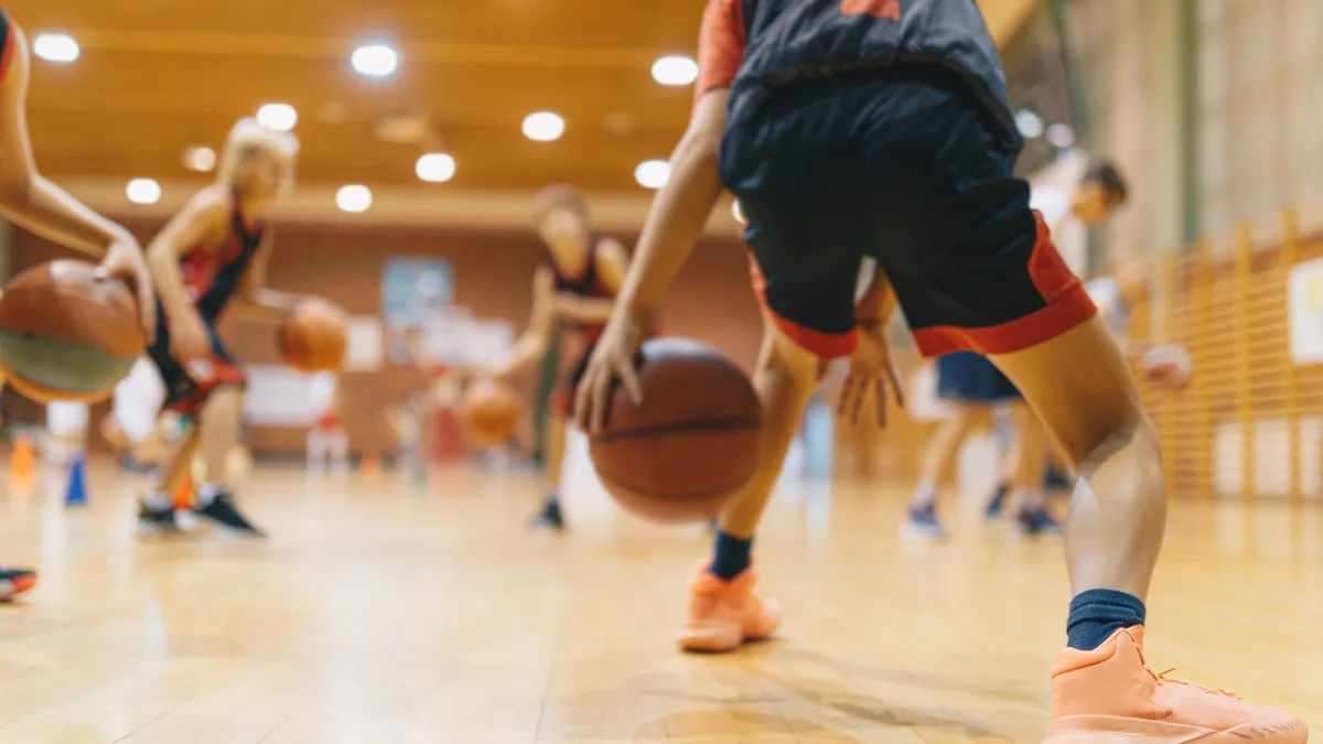 Close up of the feet of people playing basketball