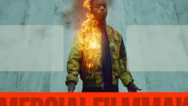 A manipulated with a man whose jacket is on fire