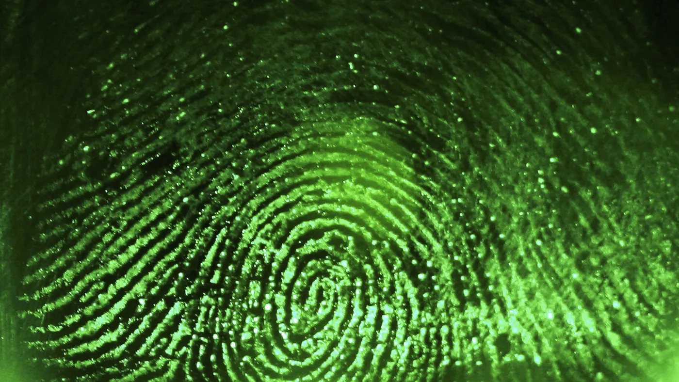 A fingerprint is scanned to prevent identity theft.