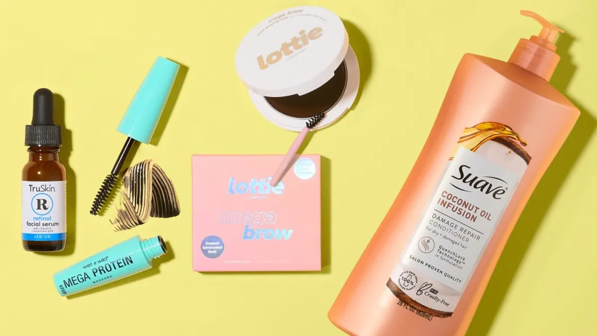 A selection of beauty products on a yellow background.