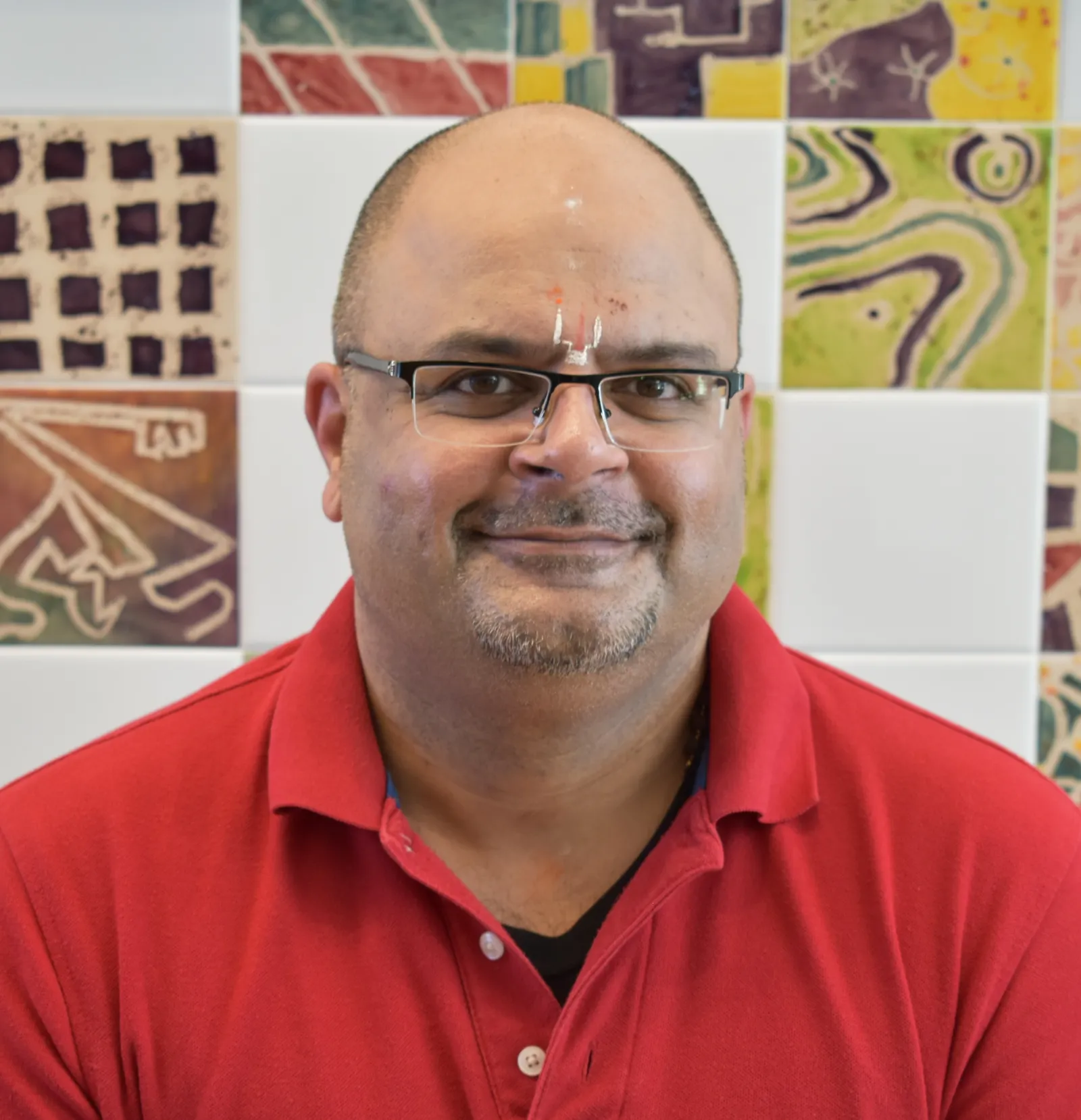 This is a headshot of Ashley Kannan, an 8th grade American History and African American Studies teacher at Percy Julian Middle School in Oak Park, Ill.