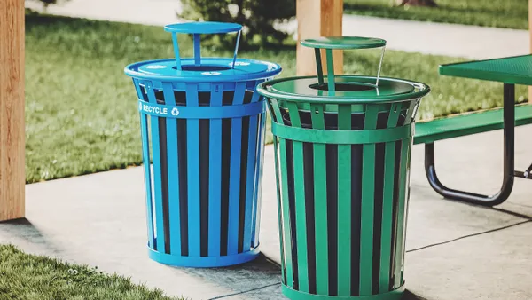 two outdoor waste bins