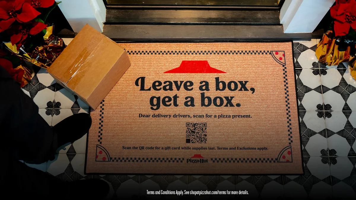 Pizza Hut launches “Reverse Delivery” doormat to award pizza to delivery drivers.