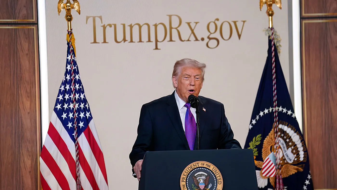 A photo of President Trump in front of a TrumpRx sign