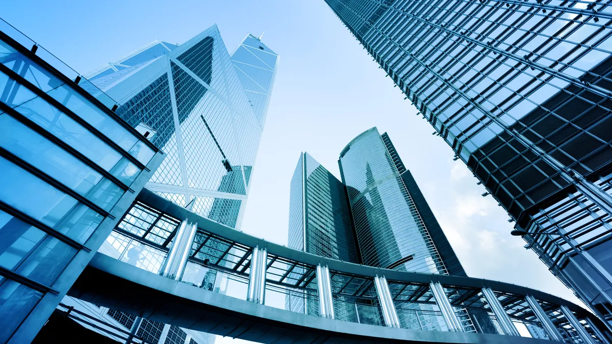 Ground view of metal and glass buildings