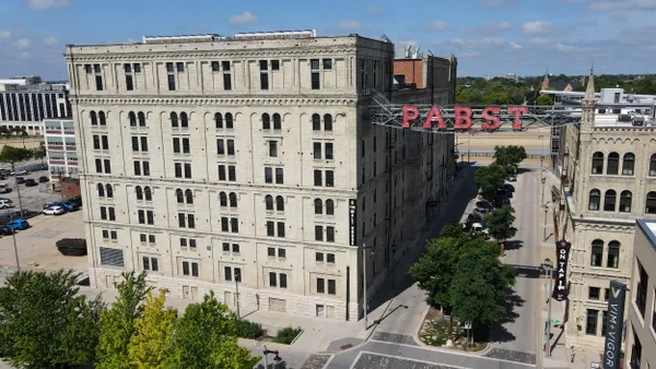 Mid-rise brick industrial building turned into apartments