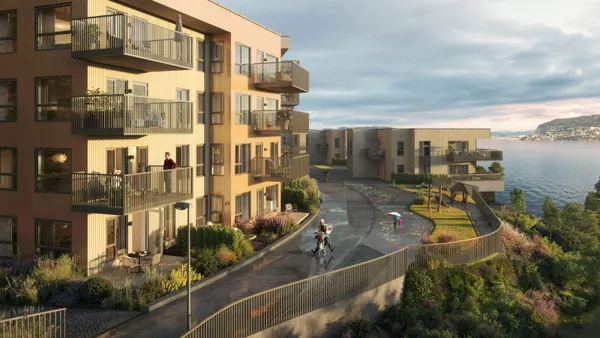 A rendering of an apartment building on the waterfront.