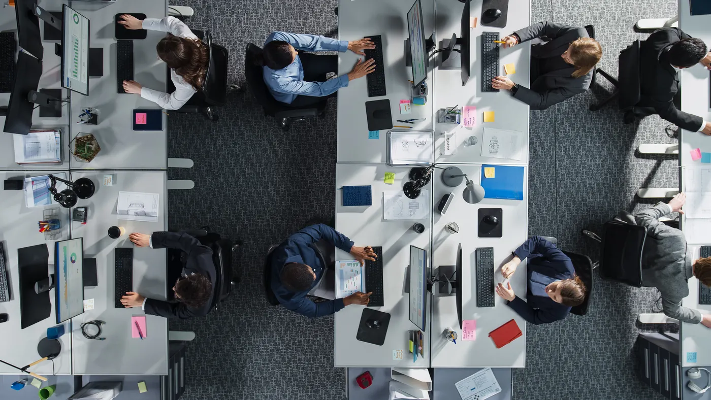 Colleagues Working In Corporate Office