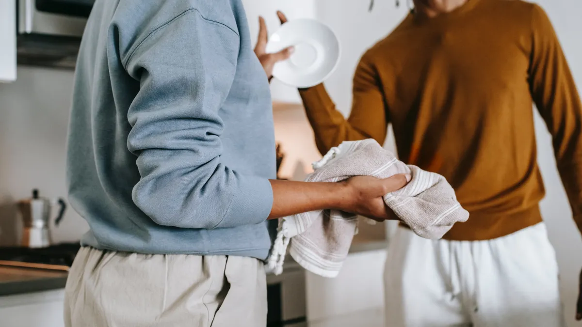 An anonymous couple argues in the kitchen