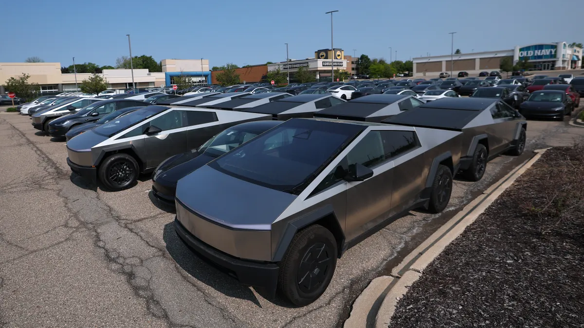 Tesla vehicles in a Michigan mall parking lot on June 2, 2025