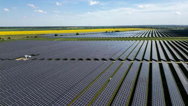 In this aerial view, solar panels point to the sky at the Weesow-Wilmersdorf solar park by energy supplier EnBW AG on May 03, 2024 near Grischow, Germany.