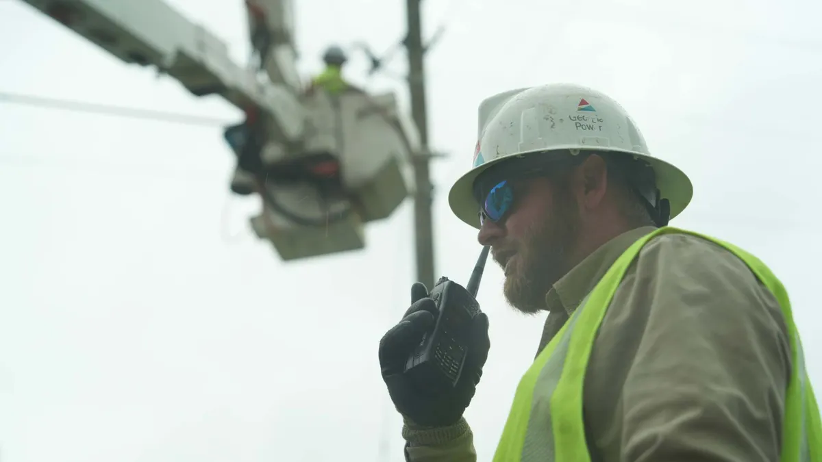 Construction worker wearing work helmet