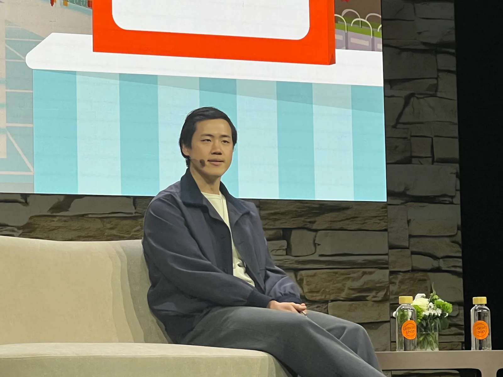 DoorDash Co-Founder Andy Fang speaking at the Groceryshop conference in Las Vegas
