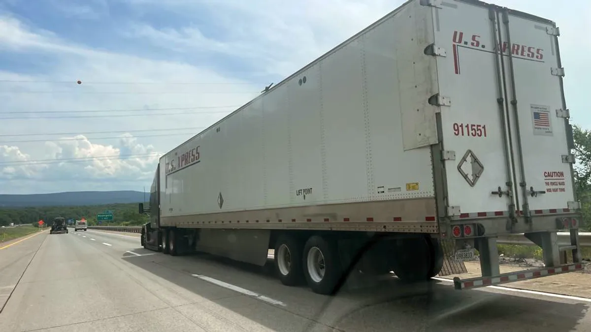 A U.S. Xpress tractor-trailer on the highway.