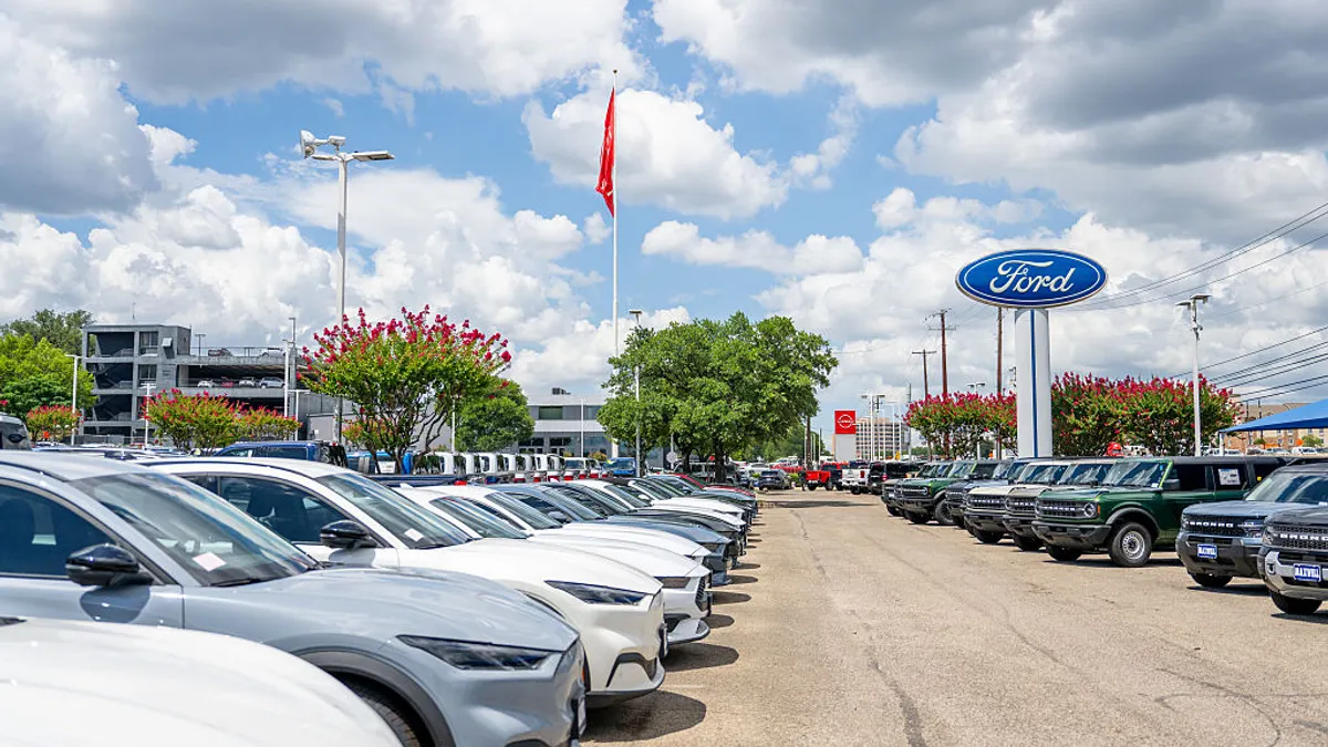 Ford Mustang Mach-E vehicles parked outside on a Ford dealership lot on June 24, 2025 in Austin, Texas.