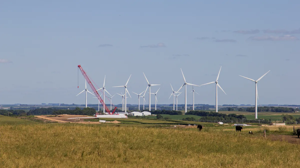 Crane sitting ready to start building a new wind turbine.