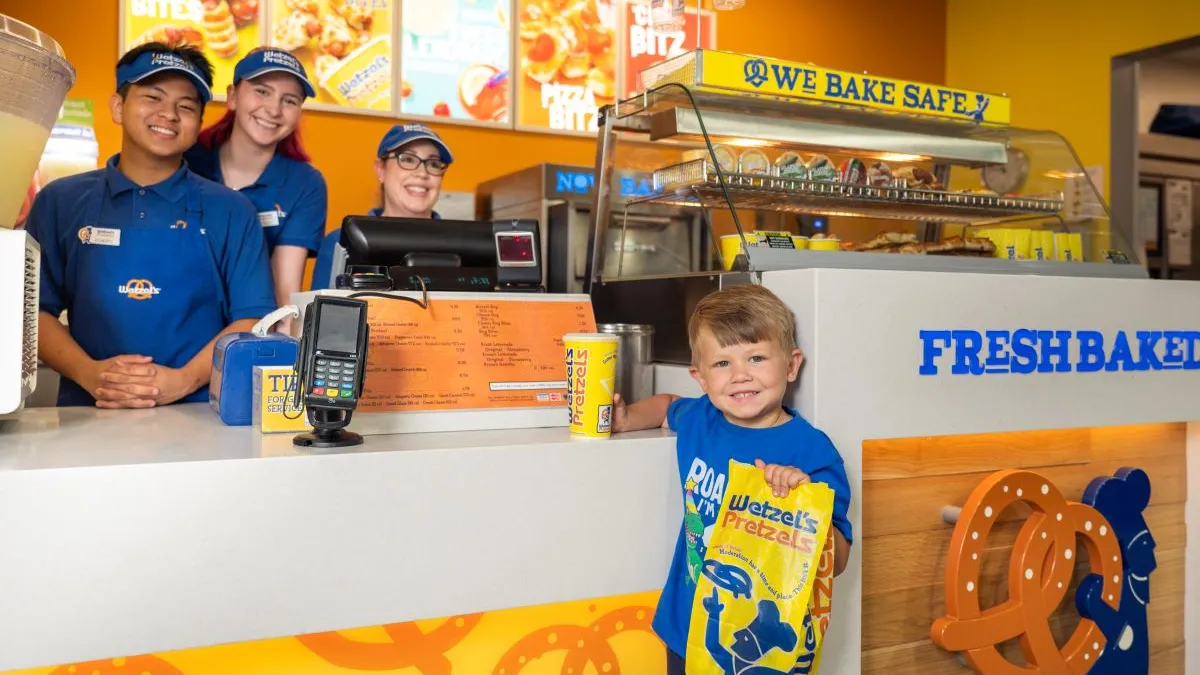 An image of a Wetzel's Pretzels inside a convenience store.